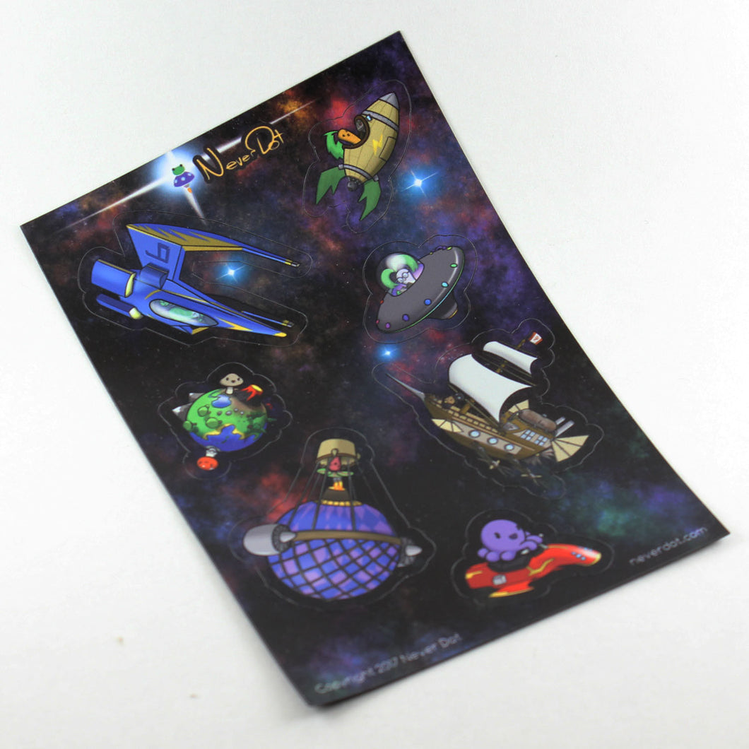A magnet sheet showing 6 spaceships of different eras and technology levels and one tiny planet with two unexpectedly happy mushrooms inhabiting it