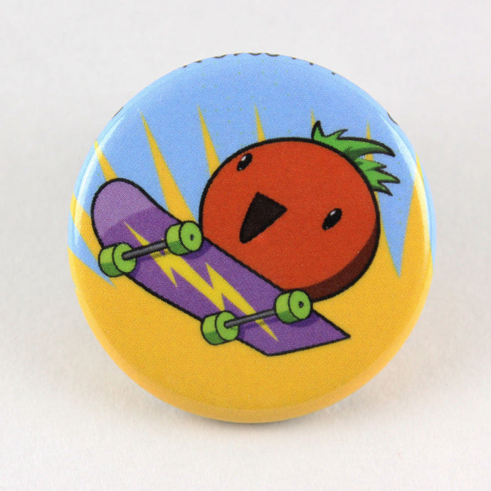 Button pin demonstrating the l33t skillz of a sk8r tomato doing an awesome skateboard move that... okay, I'm not really a skateboarder, I'm just responsible for the ALT text on these things, so let's say he's doing a 360 turnpike and call it a day