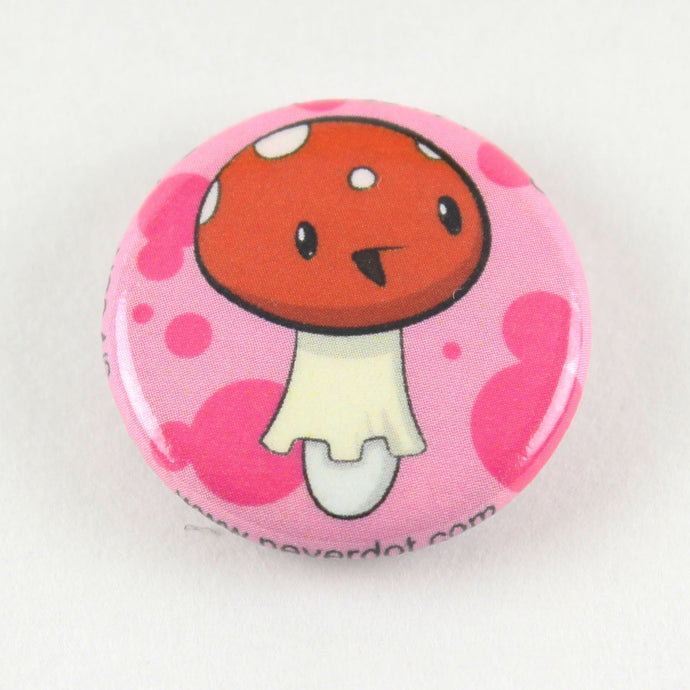 Magnet button showing a happy amanita mushroom, poisonous but sweet