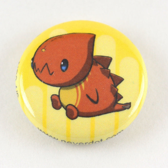 Magnet button featuring a squat little red monster with big teeth and spikes on his back.  Careful with your fingers, he bites